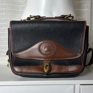 Vintage Dooney & Bourke Black and Brown Messenger Bag with Structured Design